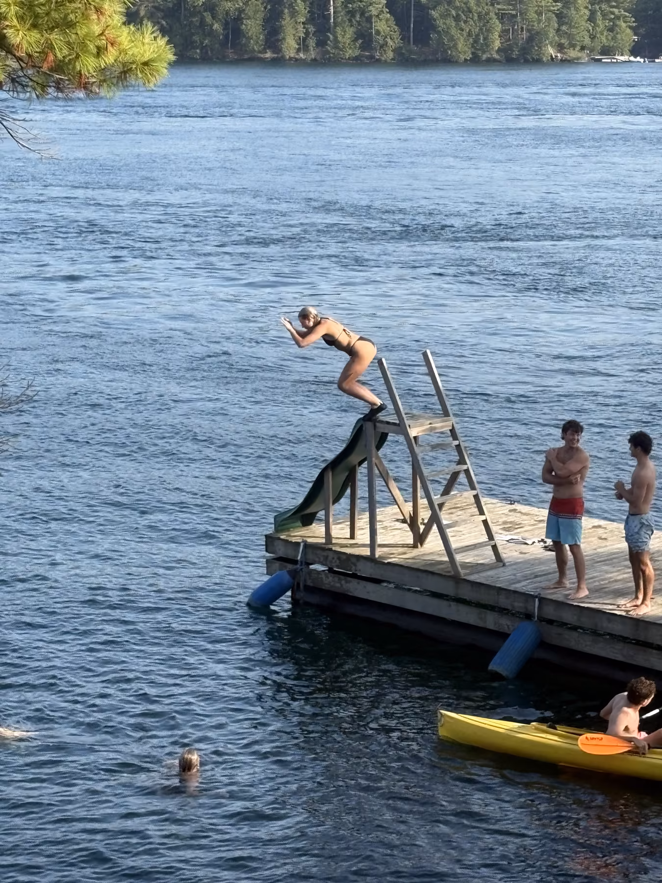 The private dock and waterslide beside the river
